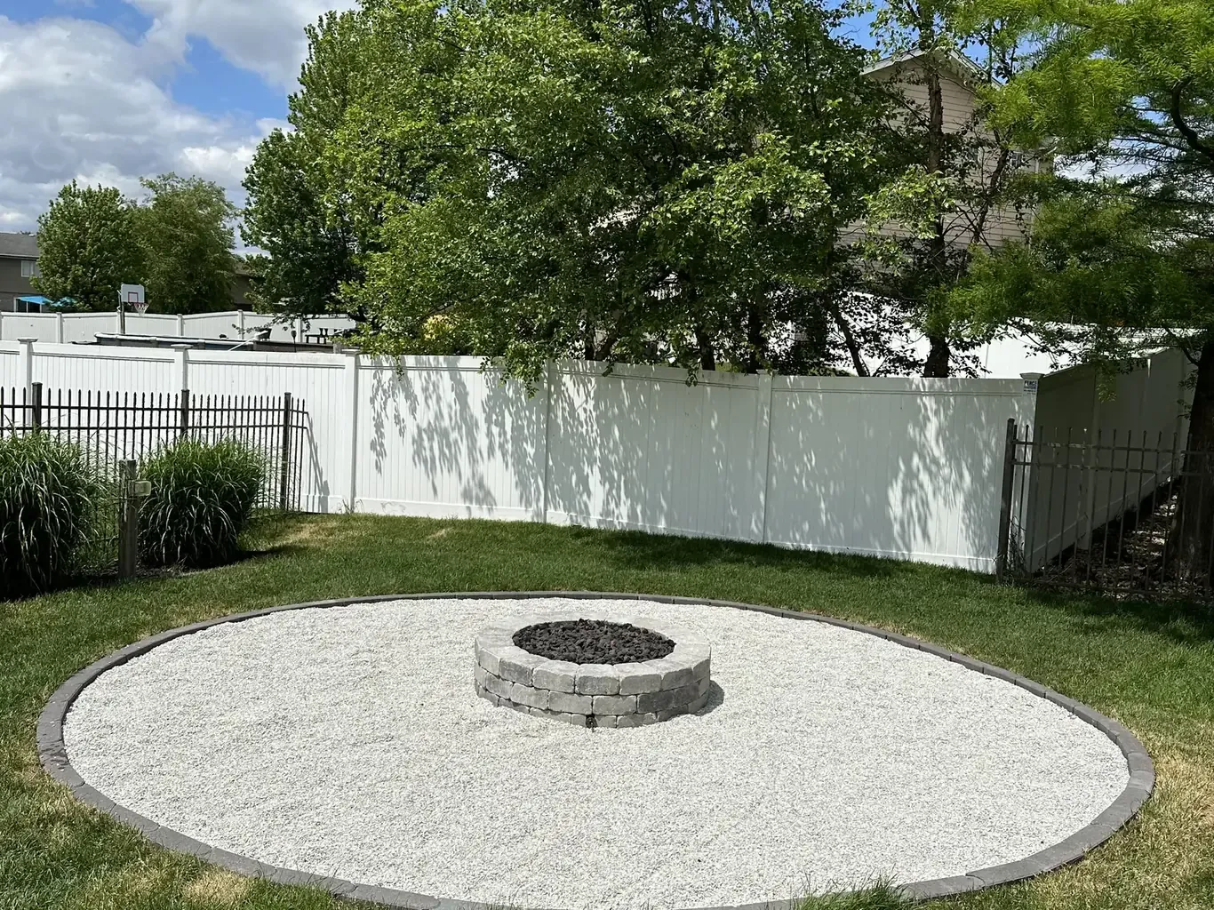 After: Frankfort Backyard Firepit & Paver Patio by Rodak Landscaping
