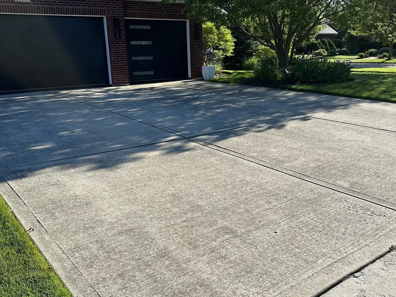 Paver Driveways in Frankfort before Rodak Landscaping started: Frankfort Paver Driveway with Charcoal Accent Border