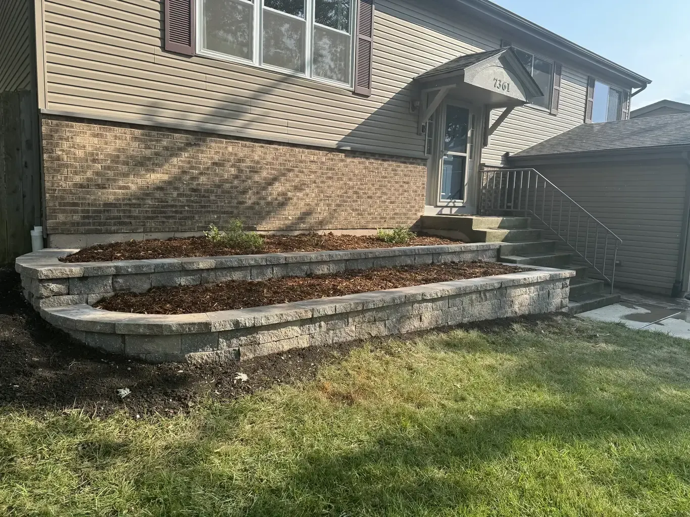 After: Frankfort Tiered Retaining Wall with Paver Walkway by Rodak Landscaping
