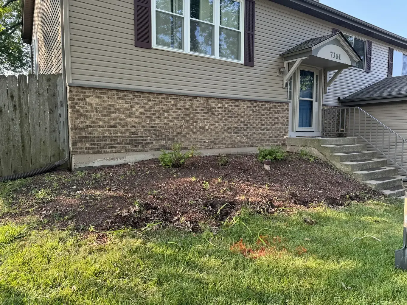 Before: Frankfort Tiered Retaining Wall with Paver Walkway by Rodak Landscaping