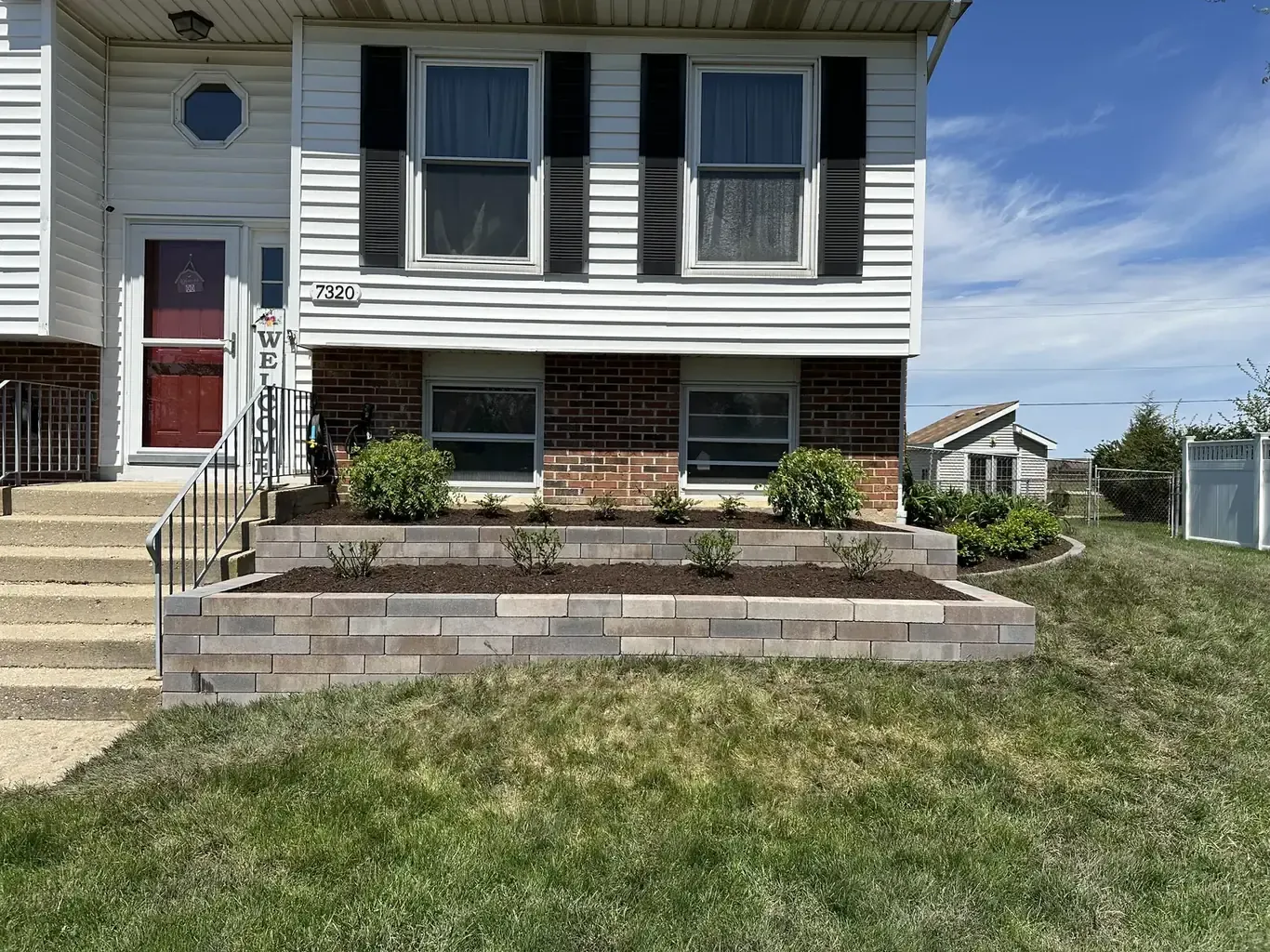 Frankfort Modern Front Yard with Curving Tiered Wall, retaining walls in Frankfort by Rodak Landscaping