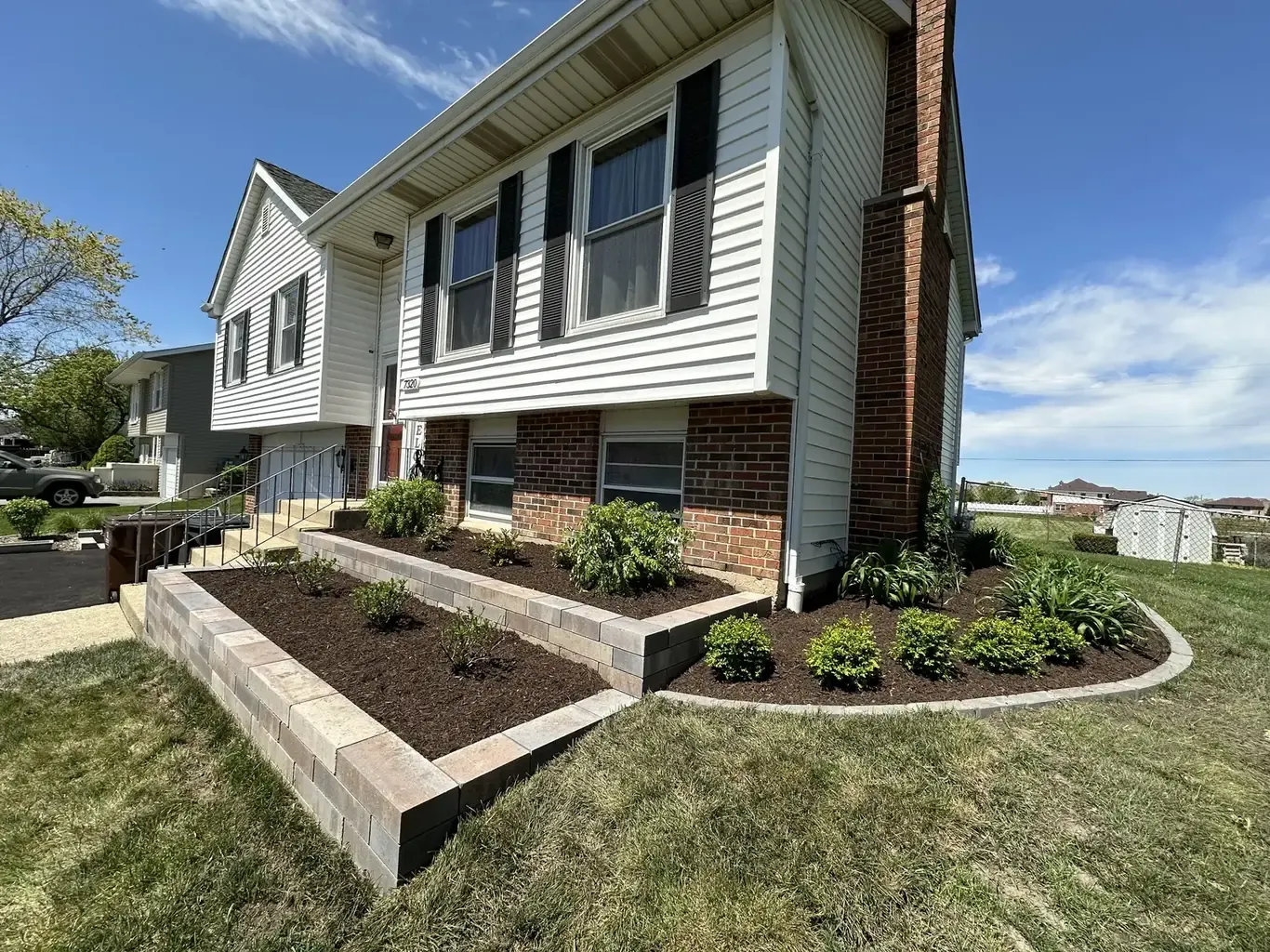 After: Frankfort Modern Front Yard with Curving Tiered Wall by Rodak Landscaping