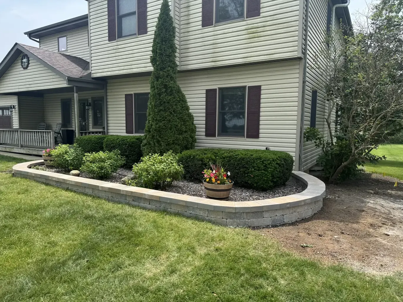 Finished retaining walls in Frankfort by Rodak Landscaping: Frankfort Stone Wall & Above-Ground Pool Surround