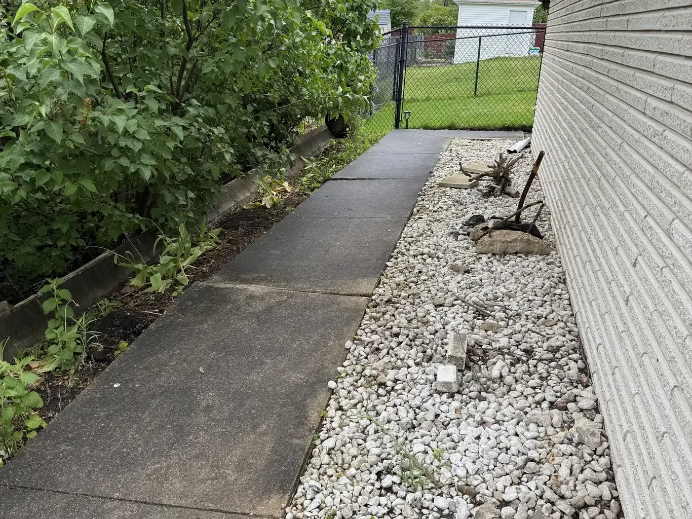 Before: Lockport Side Walkway & Retaining Wall Rebuild by Rodak Landscaping
