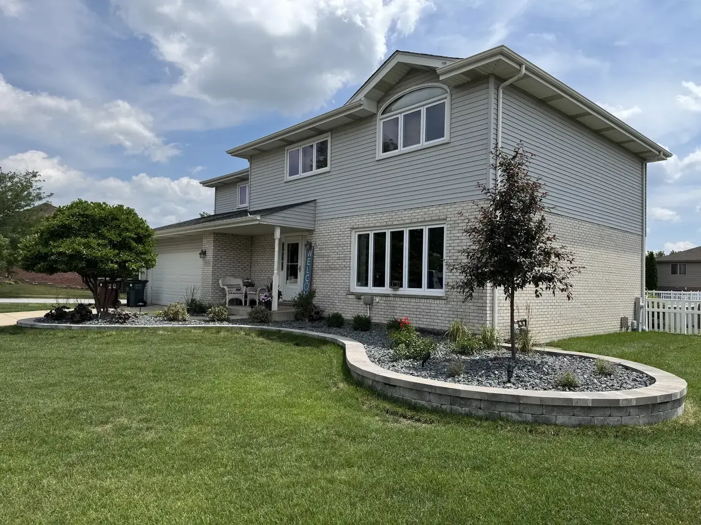 Finished landscape design in Mokena by Rodak Landscaping: Mokena Modern Front Yard Landscape Design