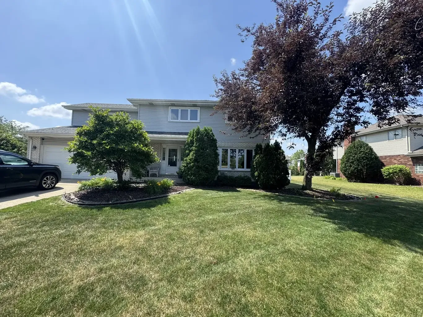 Before: Mokena Modern Front Yard Landscape Design by Rodak Landscaping