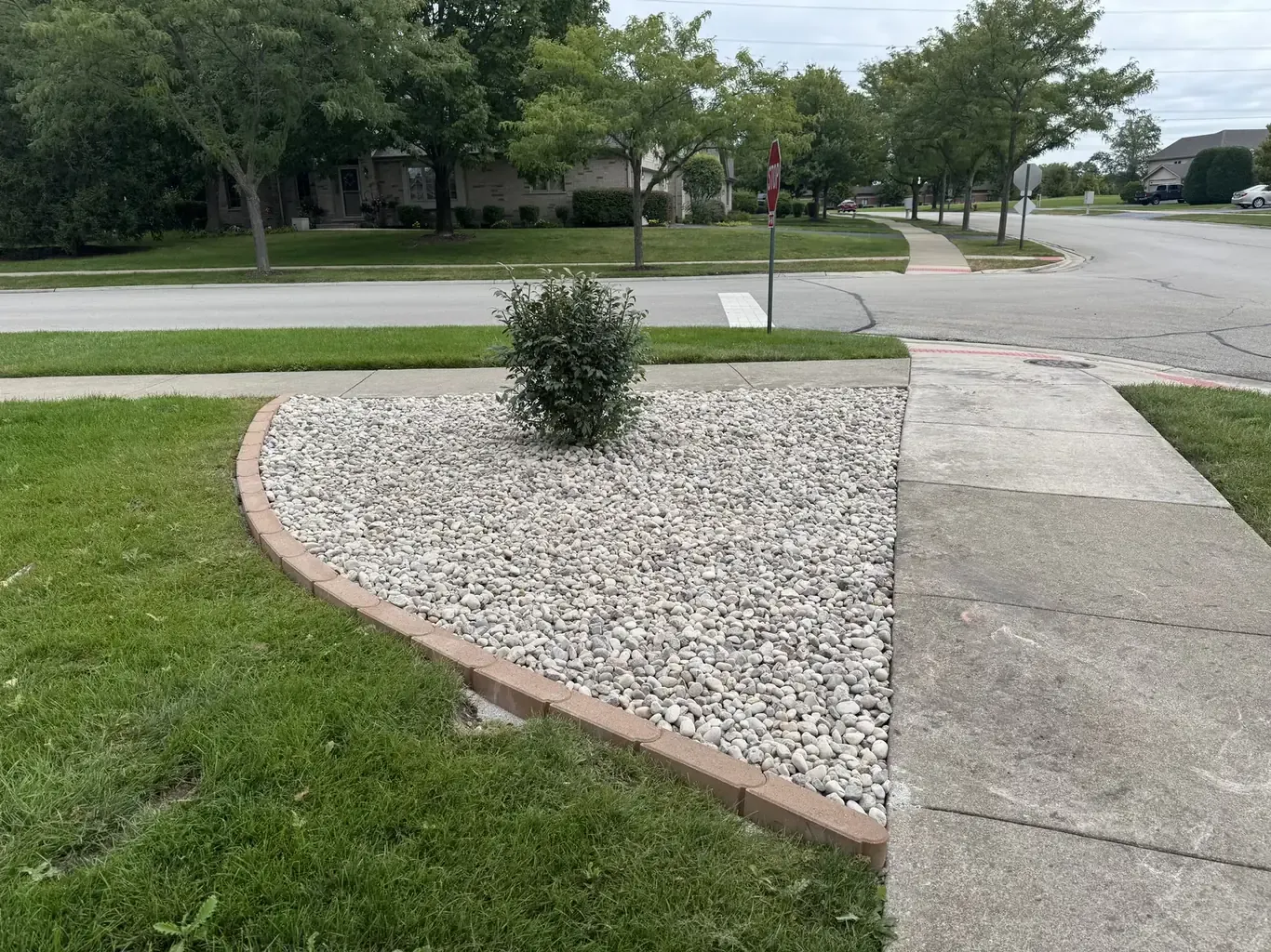 After: Mokena Front Yard Refresh with Paver Edging by Rodak Landscaping