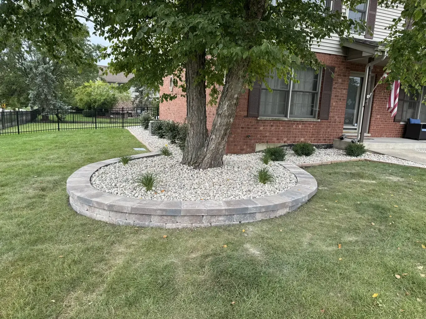 Finished landscape design in Mokena by Rodak Landscaping: Mokena Front Yard Refresh with Paver Edging