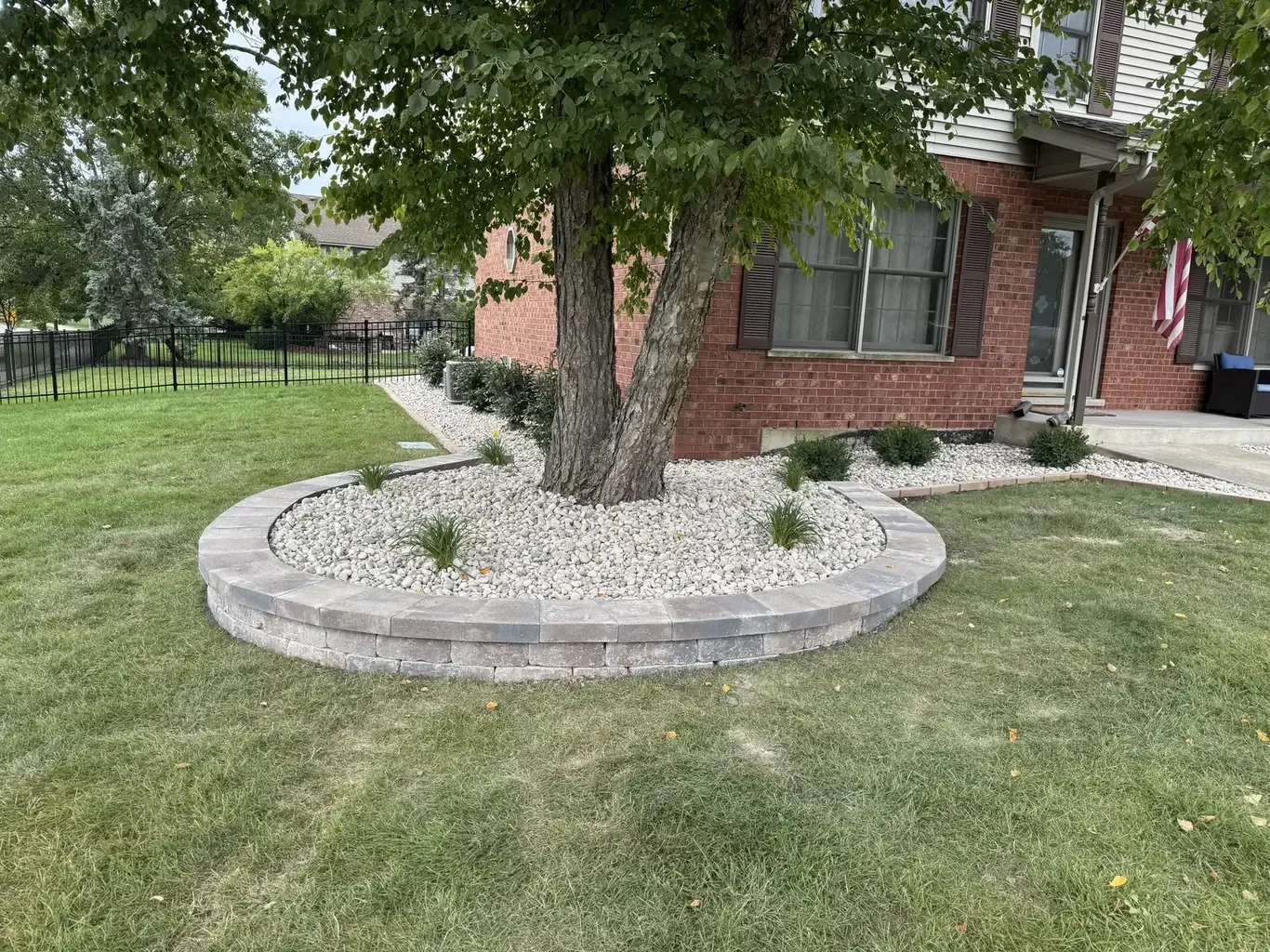 Finished landscape design in Mokena by Rodak Landscaping: Mokena Front Yard Refresh with Paver Edging