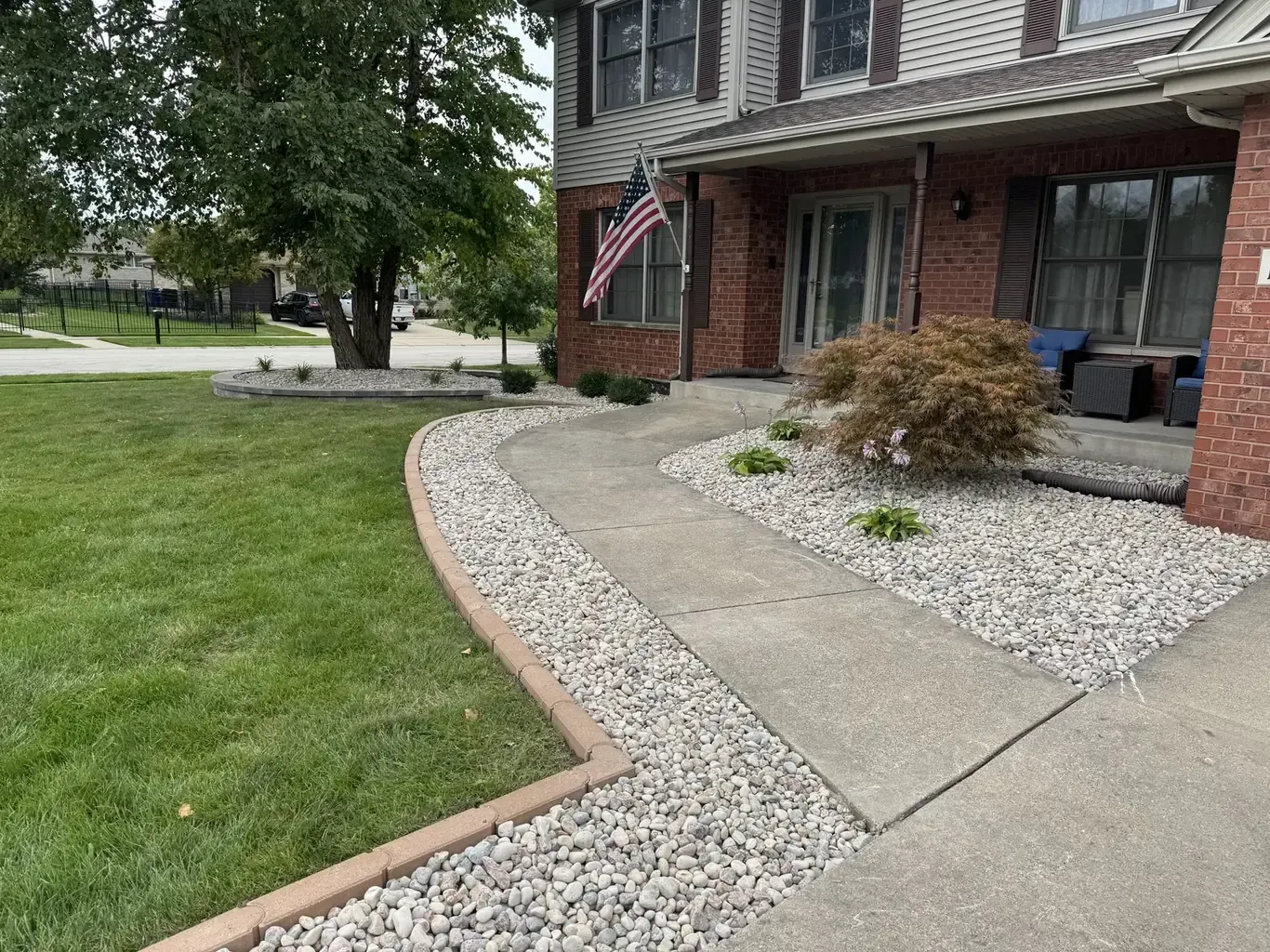 Finished landscape design in Mokena by Rodak Landscaping: Mokena Front Yard Refresh with Paver Edging