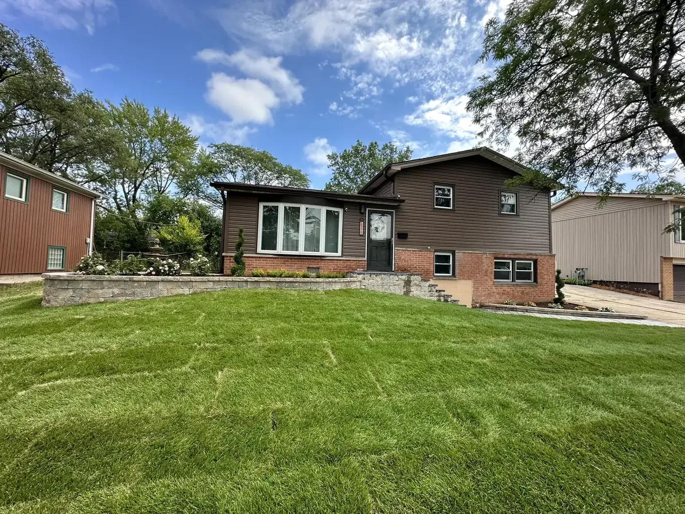 Finished retaining walls in Oak Forest by Rodak Landscaping: Oak Forest Front Yard Transformation