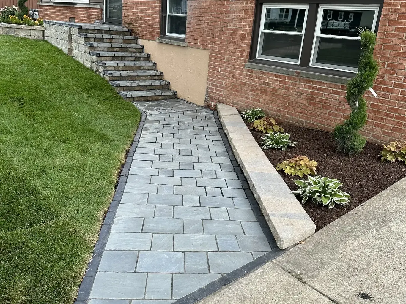Finished retaining walls in Oak Forest by Rodak Landscaping: Oak Forest Front Yard Transformation