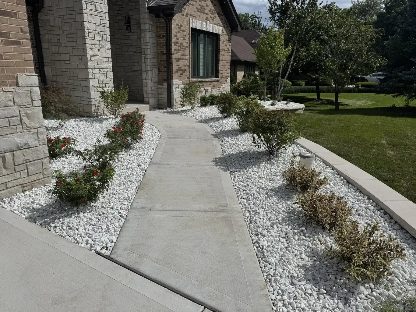 Finished paver driveways in Orland Park by Rodak Landscaping: Orland Park New Construction Full Site Build