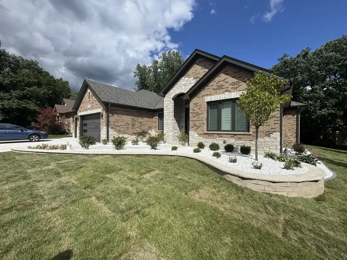 Finished paver driveways in Orland Park by Rodak Landscaping: Orland Park New Construction Full Site Build