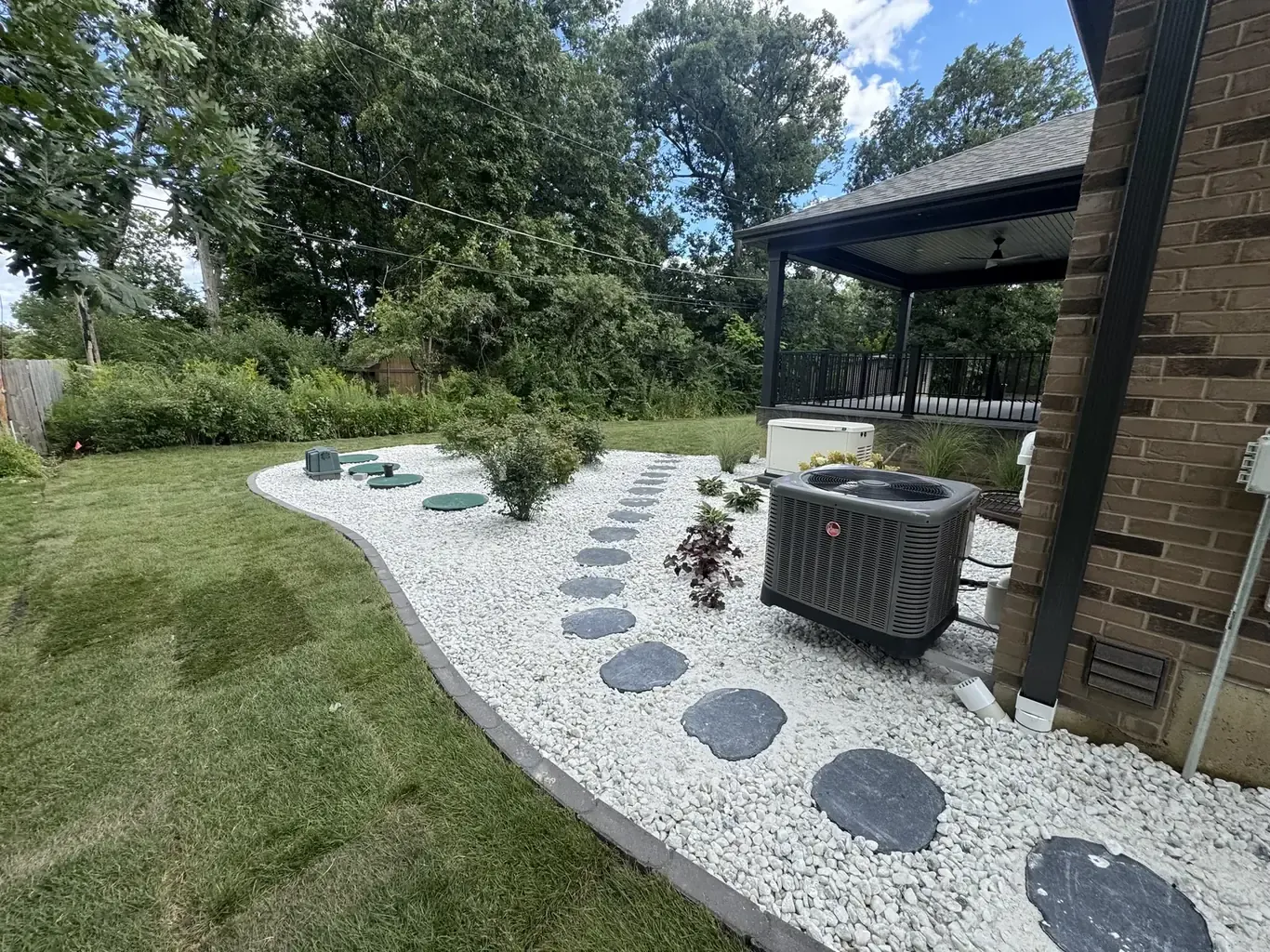 Finished paver driveways in Orland Park by Rodak Landscaping: Orland Park New Construction Full Site Build