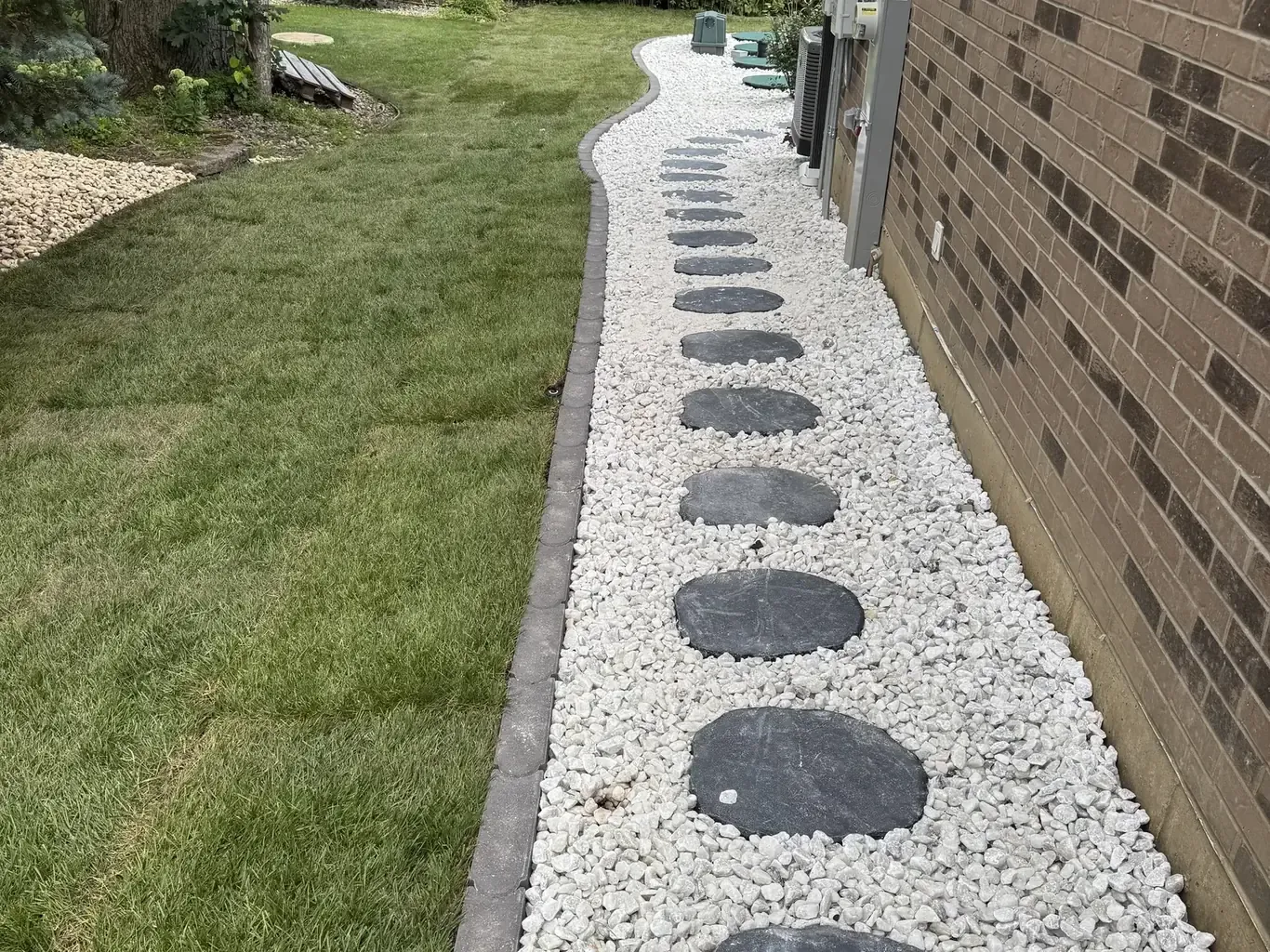 Finished paver driveways in Orland Park by Rodak Landscaping: Orland Park New Construction Full Site Build