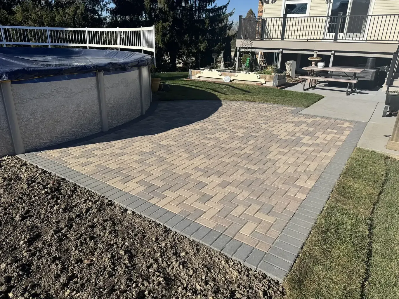 After: Orland Park Pool Paver Patio Surround by Rodak Landscaping