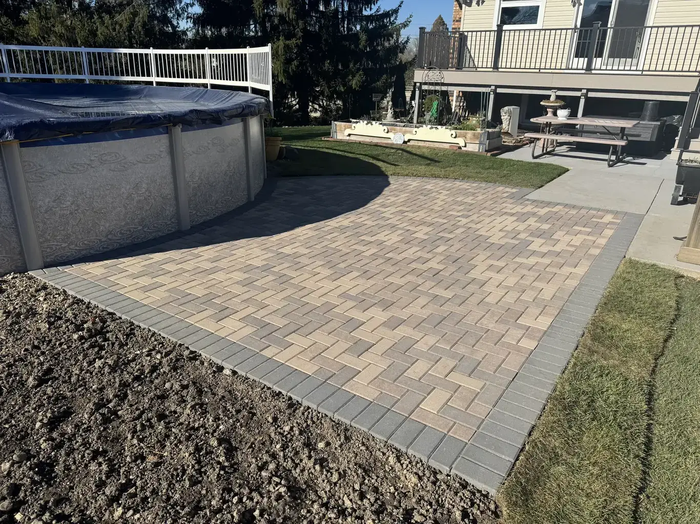 After: Orland Park Pool Paver Patio Surround by Rodak Landscaping