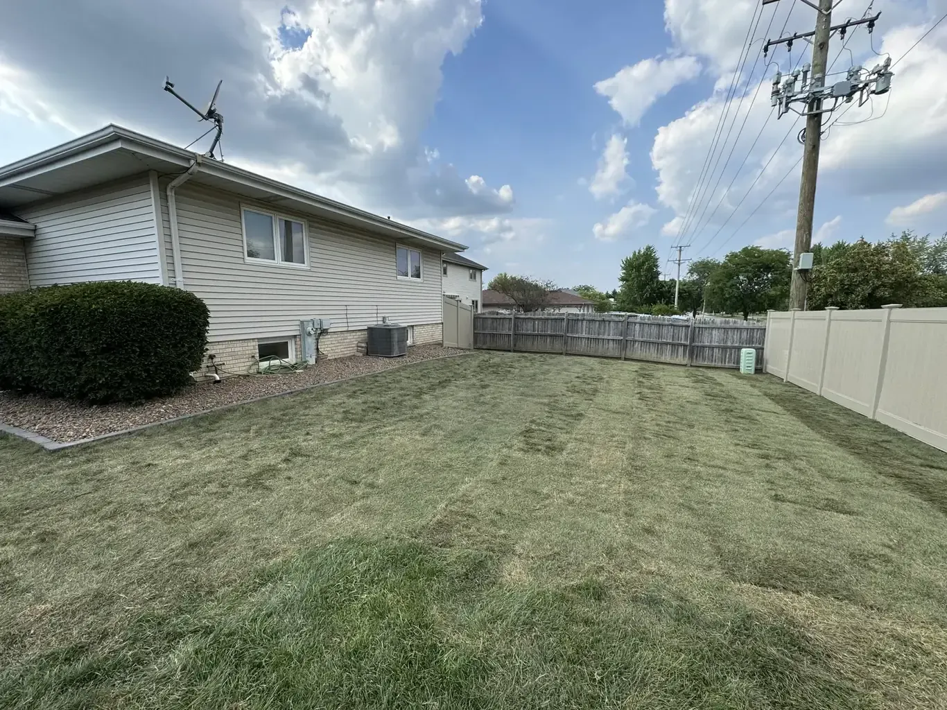Finished pool removal & restoration in the southwest suburbs by Rodak Landscaping: Above-Ground Pool Removal and Backyard Sod Regrade