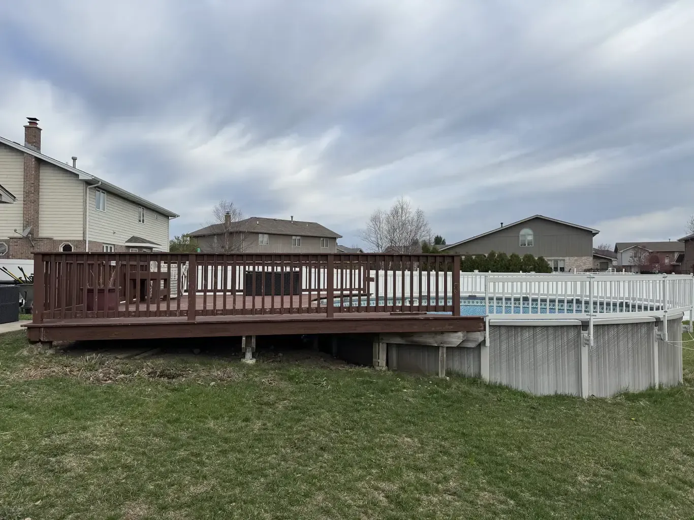 Pool Removal & Restoration in the southwest suburbs before Rodak Landscaping started: Pool and Deck Removal with Sod Restoration