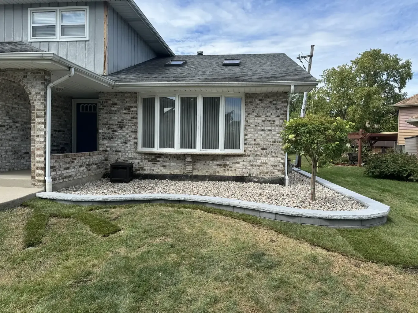 After: Tinley Park Stone-Trim Front Yard Wall by Rodak Landscaping