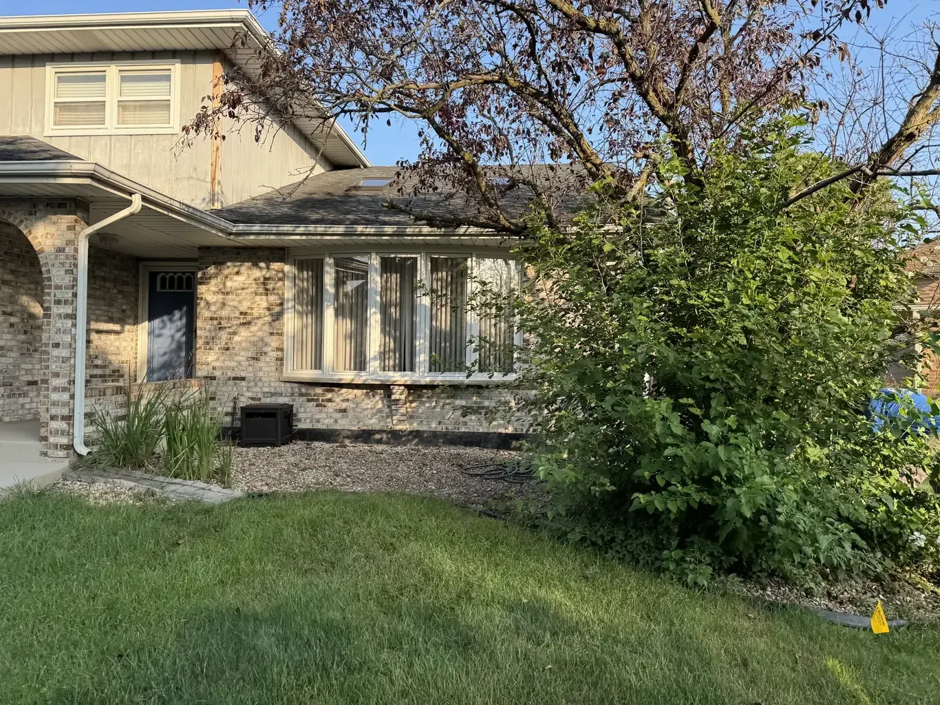 Before: Tinley Park Stone-Trim Front Yard Wall by Rodak Landscaping