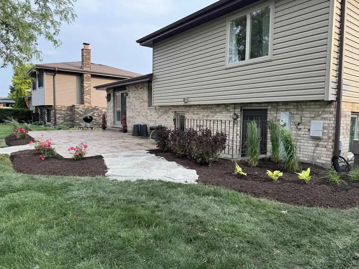 After: Tinley Park Backyard Custom Plant & Patio Design by Rodak Landscaping