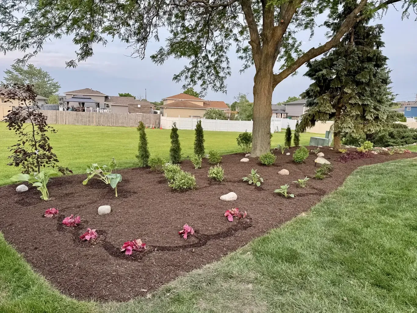 Finished landscape design in Tinley Park by Rodak Landscaping: Tinley Park Backyard Custom Plant & Patio Design
