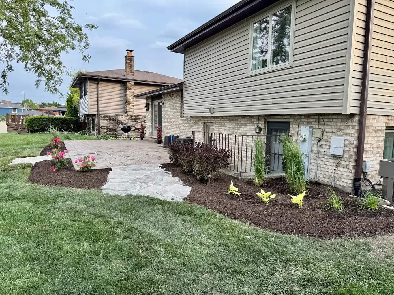 Finished landscape design in Tinley Park by Rodak Landscaping: Tinley Park Backyard Custom Plant & Patio Design